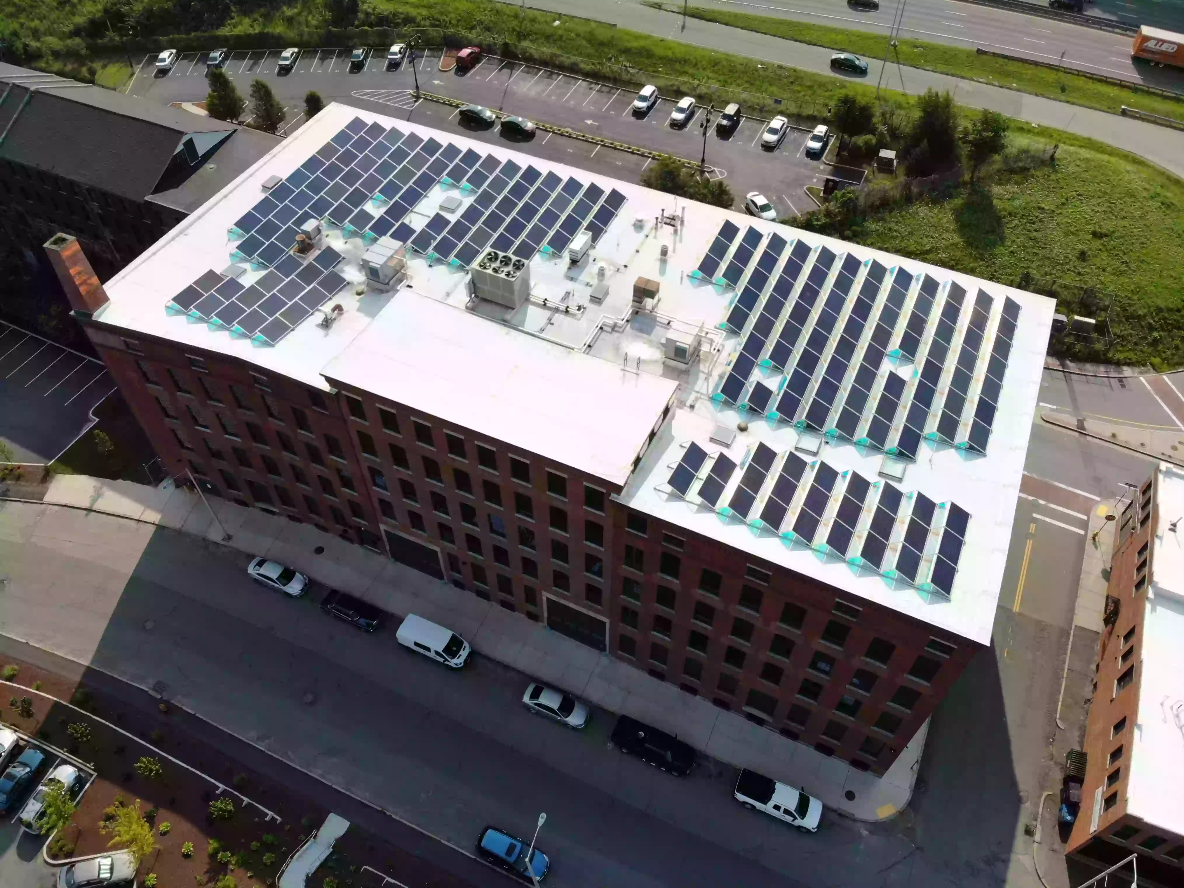 Lunex Power commercial solar installation on the Canal District Lofts building.